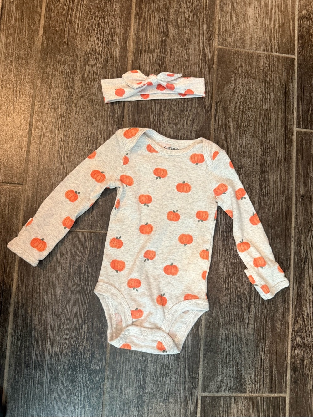 Size 3 month pumpkin bodysuit